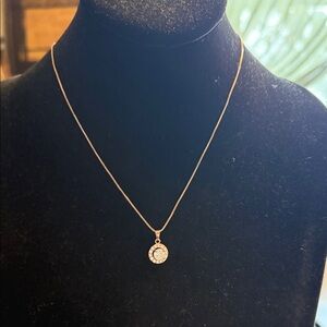 Delicate cubic, zirconia rose, gold tone, pendant necklace, with halo pendant